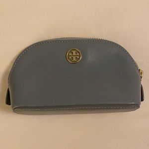 Tory Burch small makeup bag.
